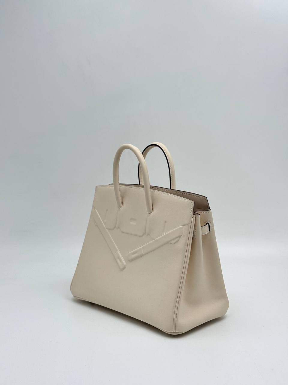 Hermès Birkin 25 Shadow Nata Swift front with embossed straps — 2