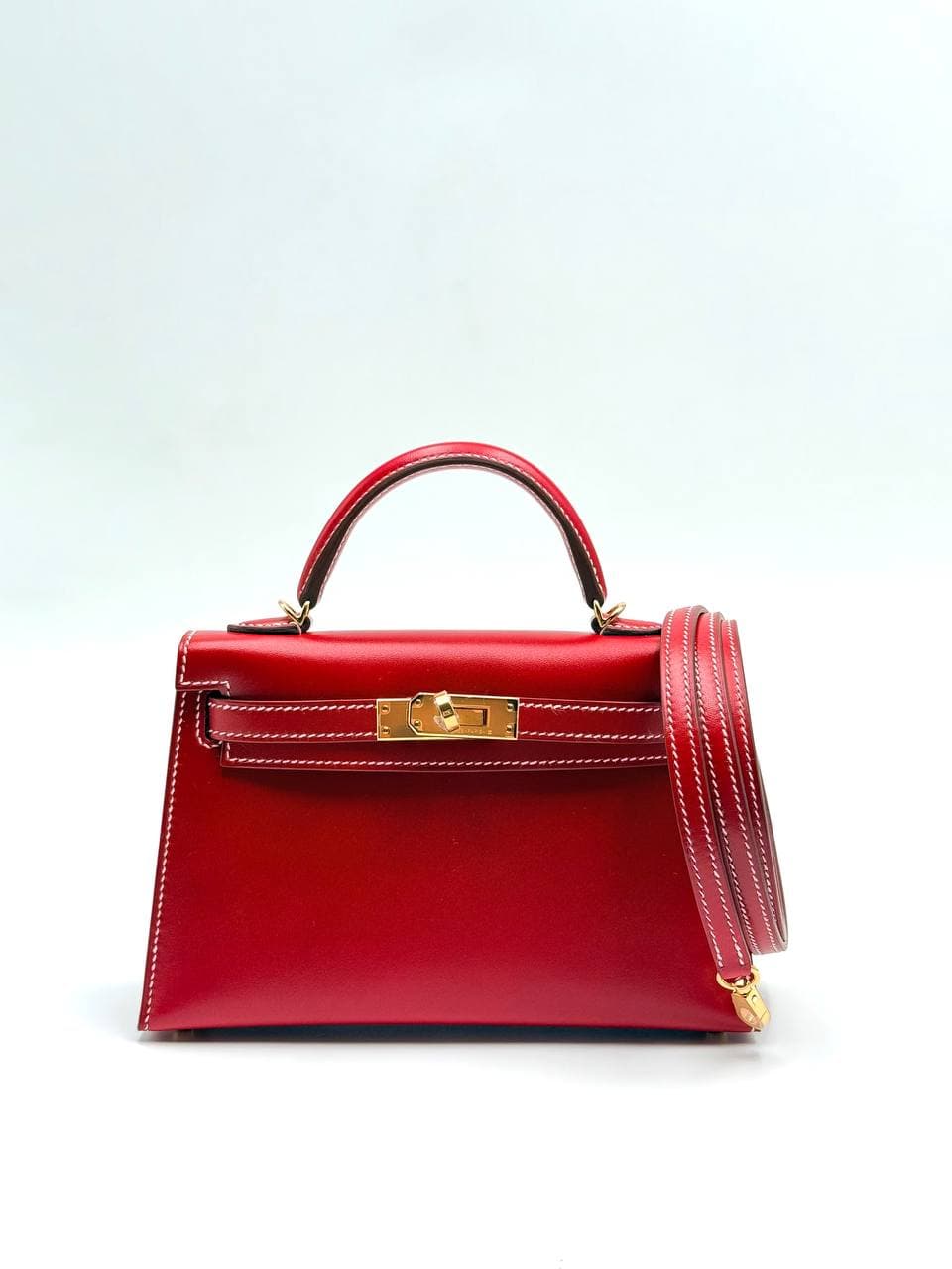 Hermès Kelly Mini II Rouge Piment Box calf front with gold hardware and strap — 2