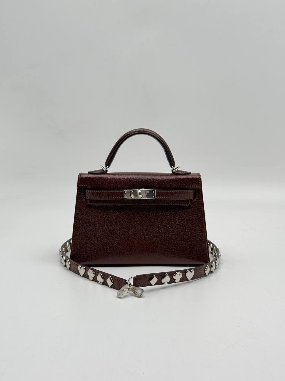 Hermès Kelly Mini II Atouts Terre Chèvre with card-suit studded strap