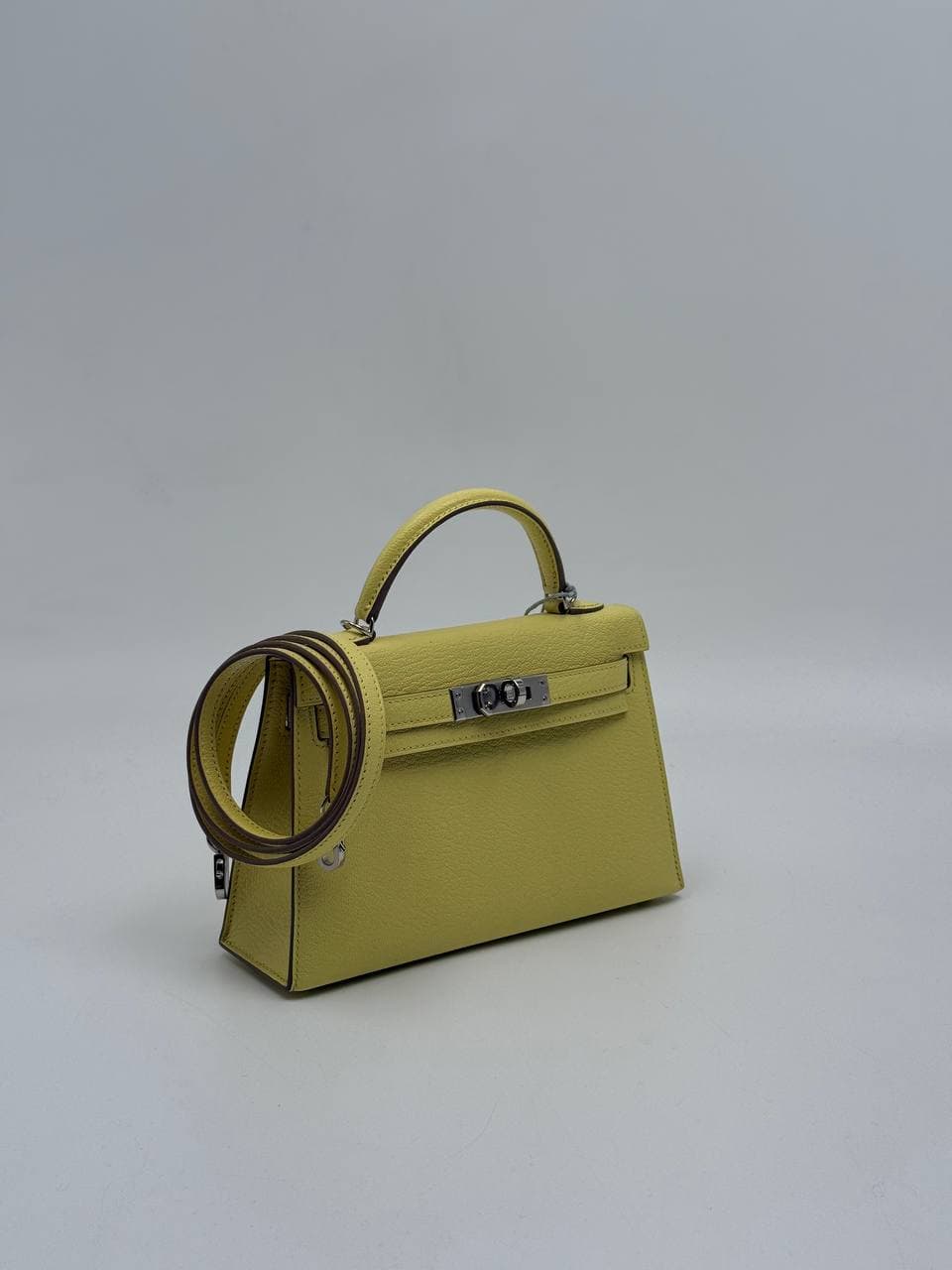 Hermès Kelly Mini II Limoncello Chèvre front with shoulder strap — 2