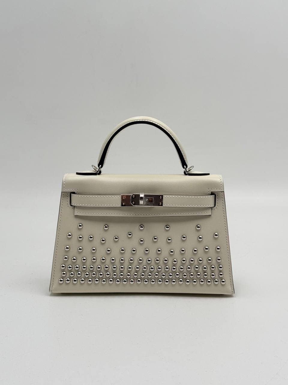 Hermès Kelly Mini II Clouté Cream Box calf with palladium studs, side view