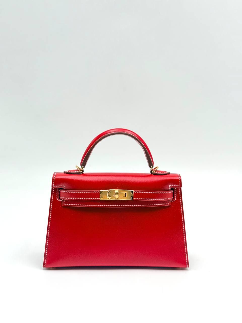 Hermès Kelly Mini II Rouge Piment Box calf front with gold hardware and strap — 3